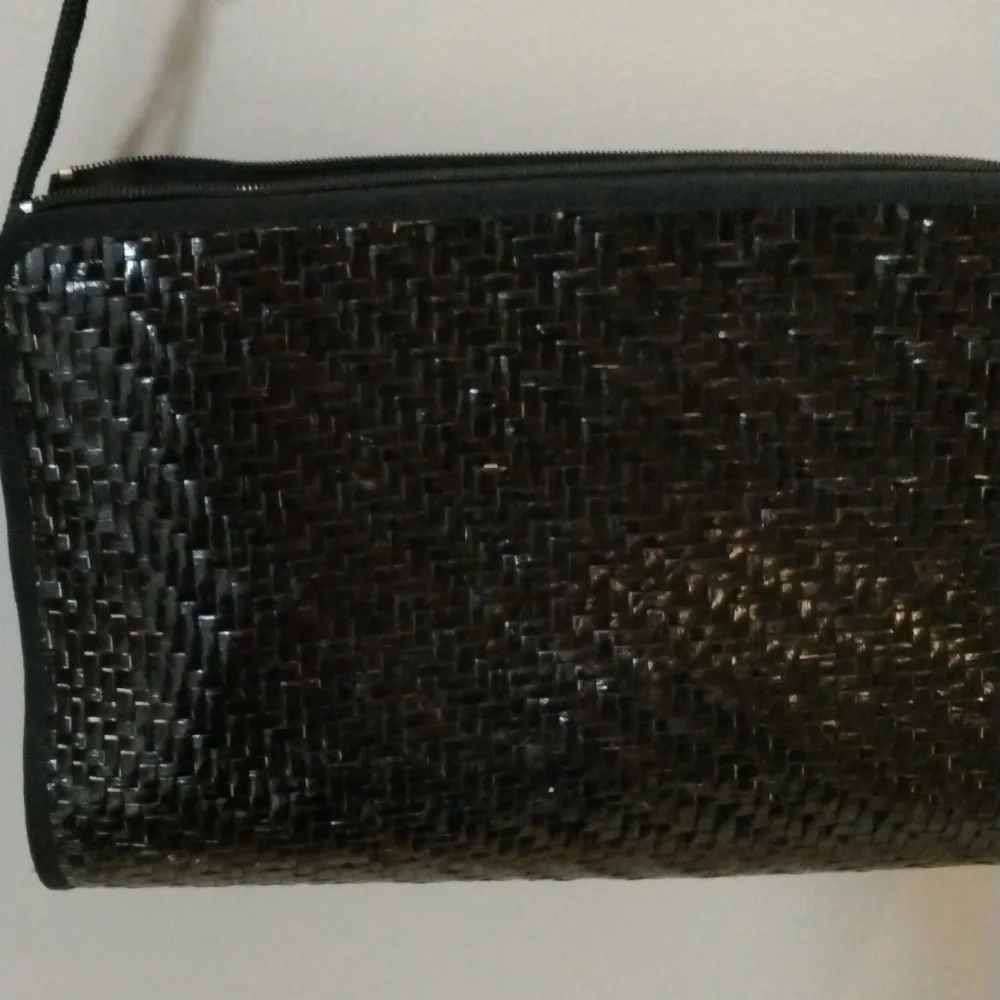 Made in Hong Kong black woven clutch